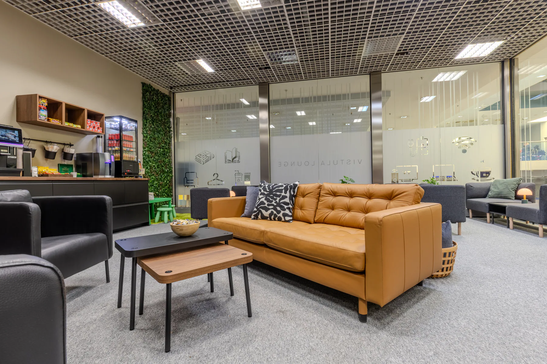 Vistula Lounge interior with comfortable seating, refreshments and warm lighting